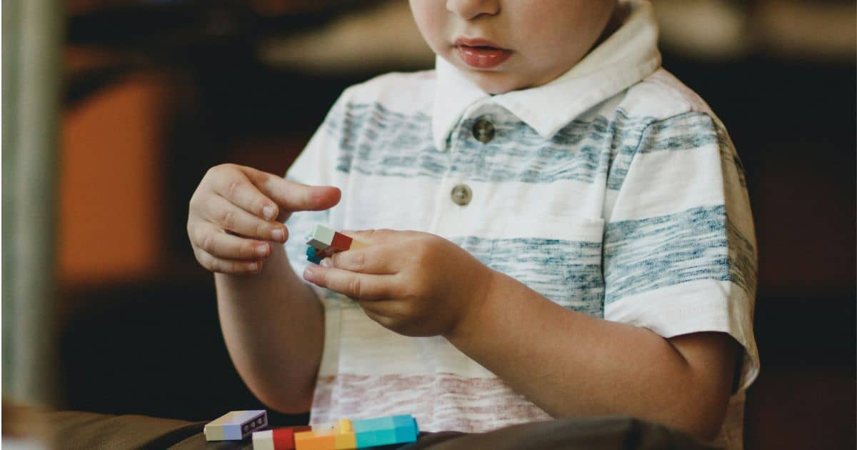 toddler playing with blocks